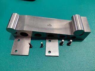 NTB metal block with plates and pins in wooden box