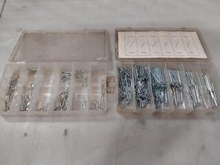 Assorted split pins and R clips in plastic cases