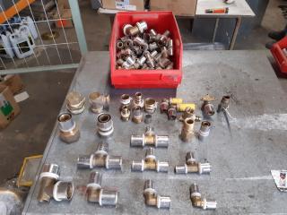 Tray of various SPK rifeng press fit pipe fittings.