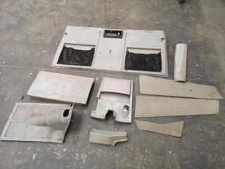 9x Assorted MD 500 Interior Panels & Components