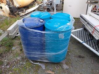 Four Plastic Drums on Pallet
