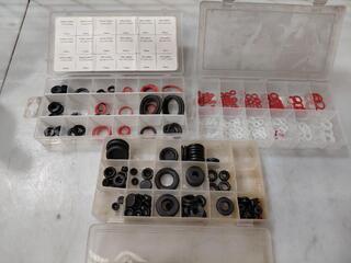 Assorted washer and grommet sets in plastic boxes