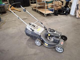 Tandem lawn mower with Kohler XT775 engine