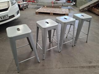Set of four metal stools