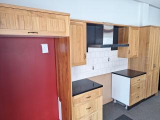 Contemporary Wooden Kitchen Cabinetry w/ Award Range Hood