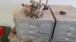 Metal Cabinet with Lathe Accessories.