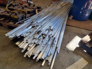 Pile of Aluminium Hinge Component Lengths