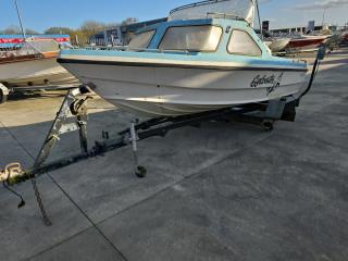 Plylite Fiberglass Boat with Johnson Outboard