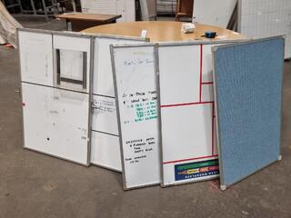 4x Double Sided Whiteboards + 1x Tackboard.
