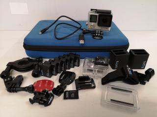 GoPro Hero 4 Action Camera w/ 8x Batteries, Assorted Accessories, Case