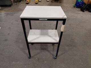 Metal trolley with two shelves on castors