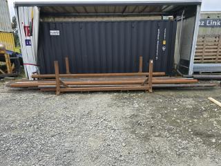 Large Lot of Steel Pipe in Frame