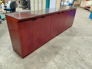 Wooden credenza with glass top