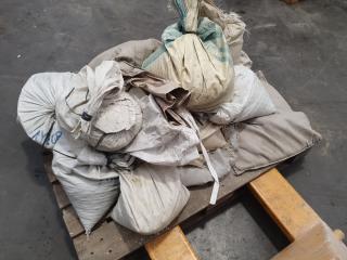 Bags containing gravel used for weighting Road Signs 