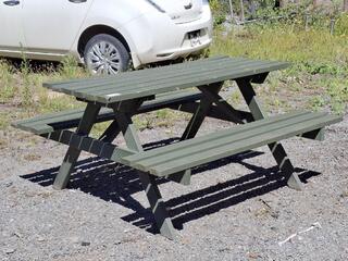 Outdoor wooden picnic table with attached benches